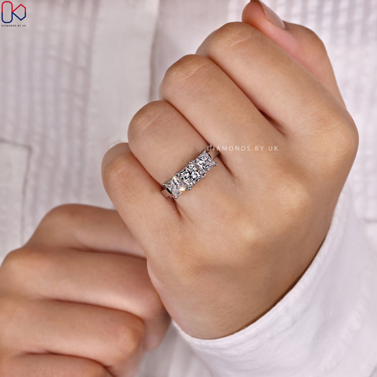 Princess cut engagement ring with secure prongs.