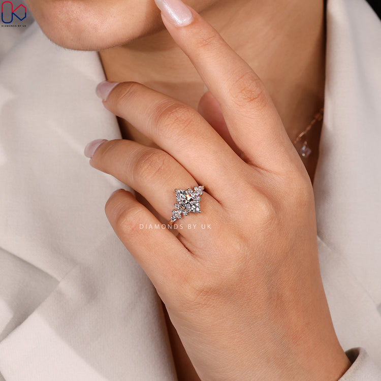 Marquise ring with basket and claw prong setting.
