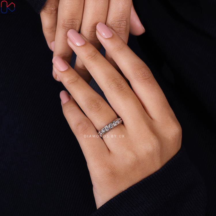 Full eternity round diamond wedding band by Diamondsbyuk.
