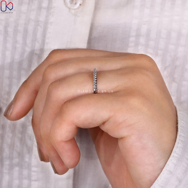 Handmade round diamond band with prong setting.