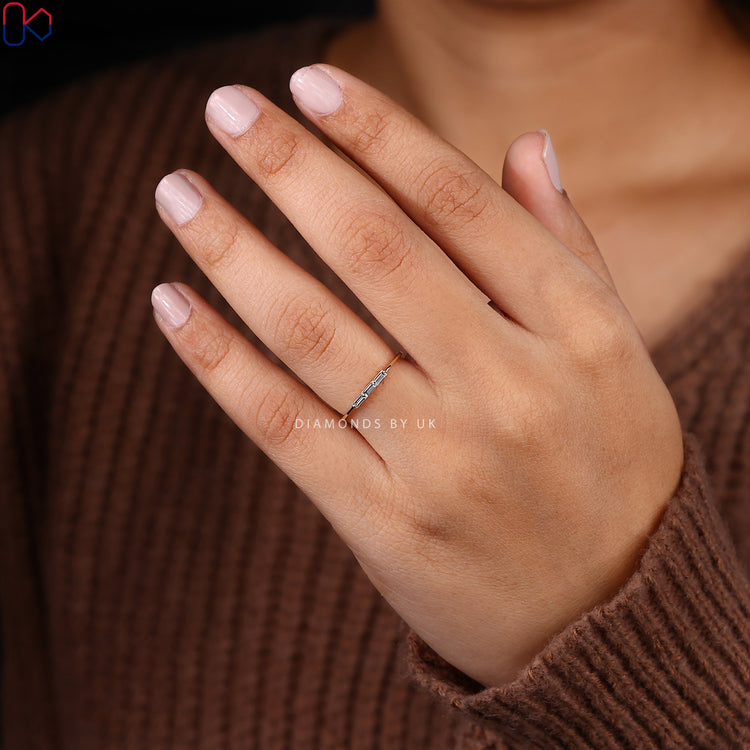 Lab grown diamond wedding band with baguette stones.
