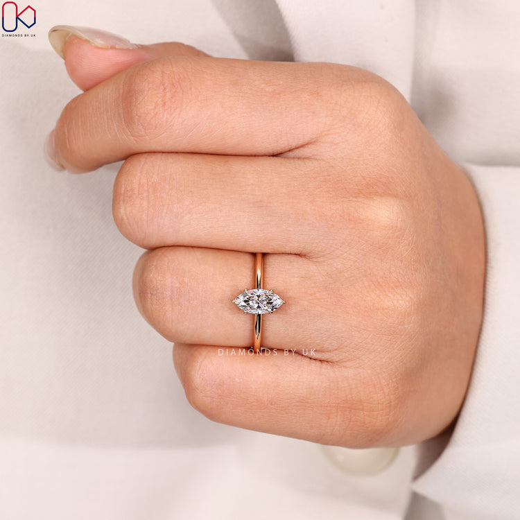 Lab grown marquise cut solitaire diamond ring.