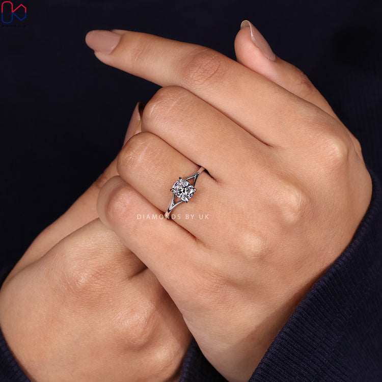Lab grown cushion cut ring with claw prong style.