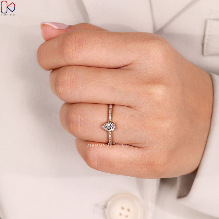 Tapered pavé pear cut lab grown diamond ring.