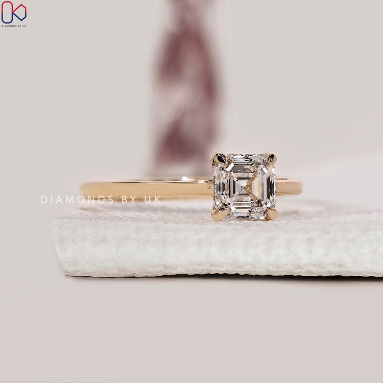Handmade Asscher engagement ring with 4 prong setting.