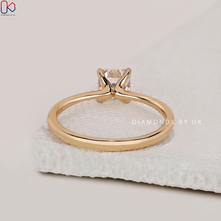 Prong setting engagement ring in yellow gold.