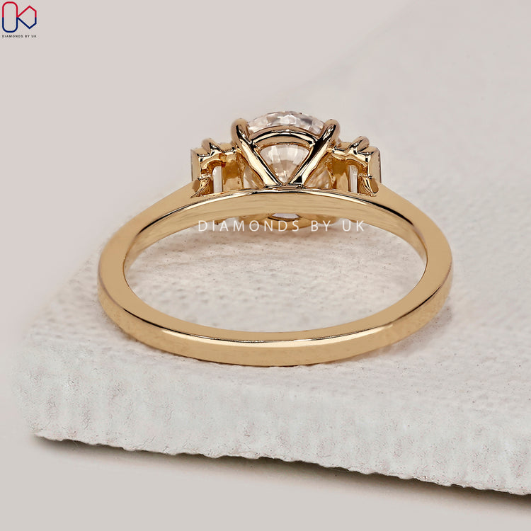 Yellow gold diamond ring and cathedral setting ring.
