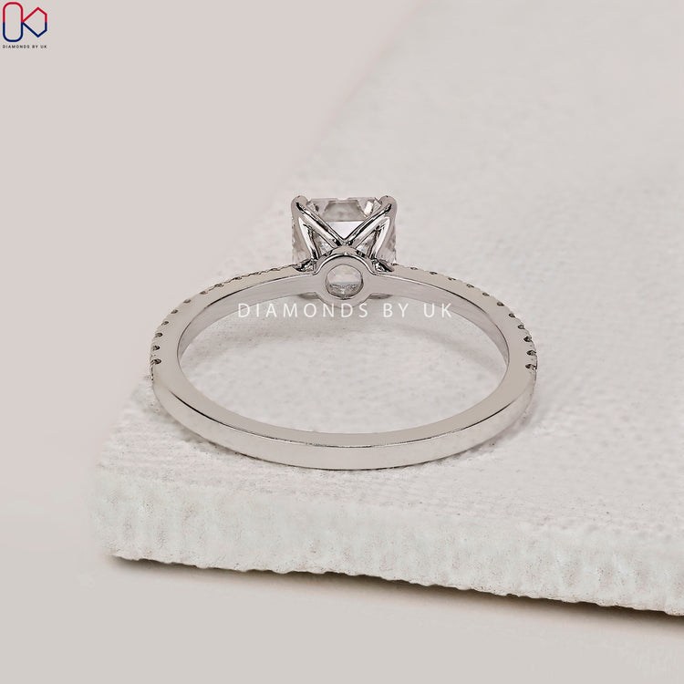 Handmade white gold engagement ring with Asscher diamond.