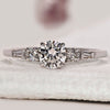 5 stone diamond ring with a bright setting in a classic style.

