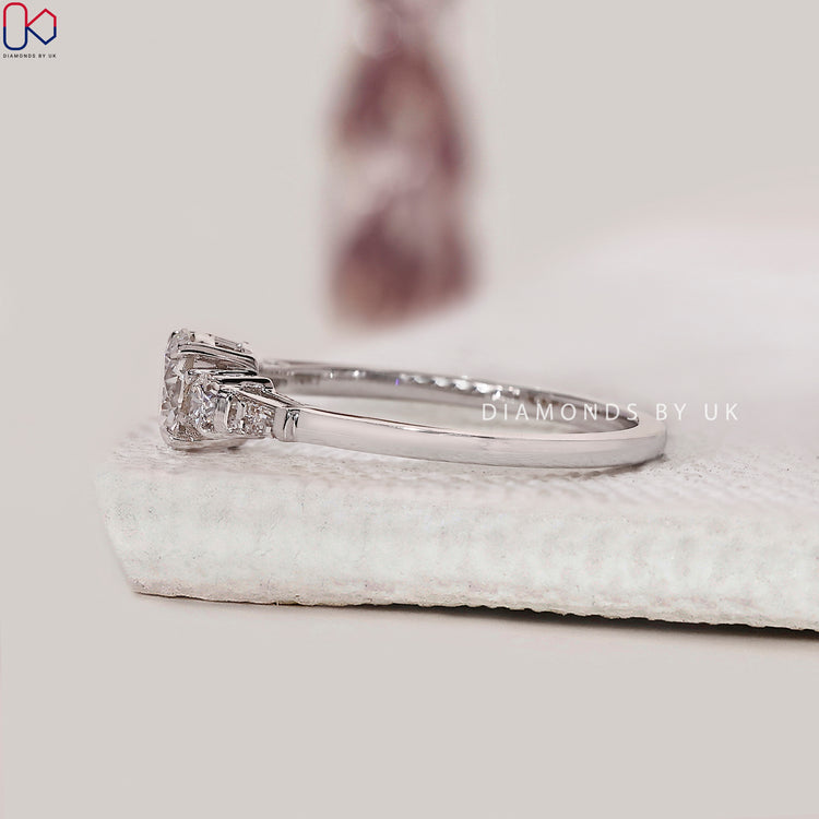 White gold engagement ring with polished surface.
