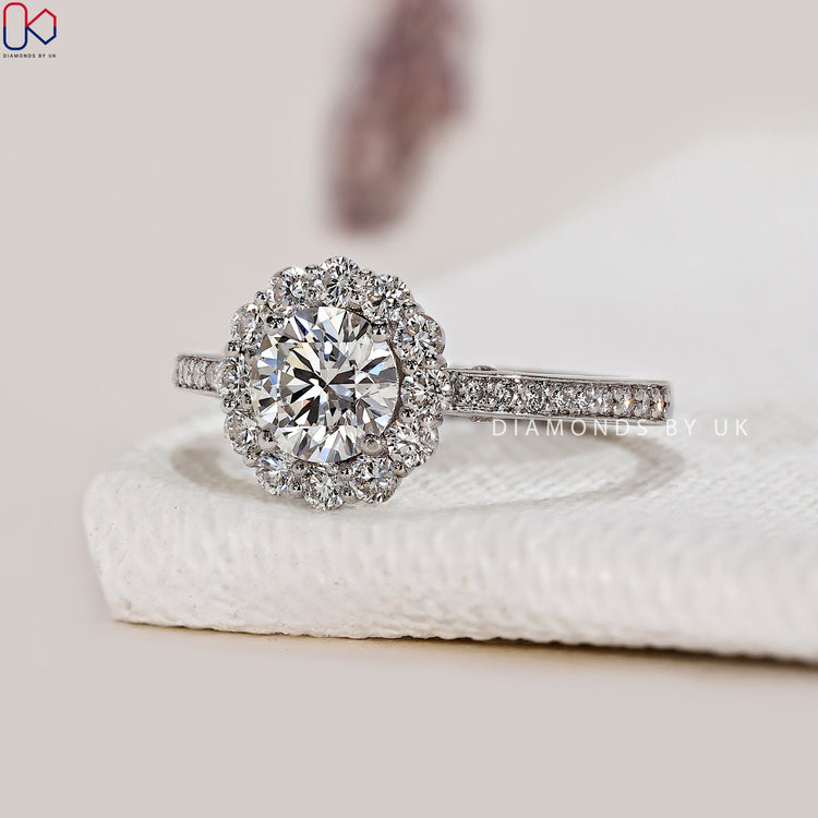 White gold ring with a Halo Diamond Engagement Ring design.
