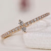 A yellow gold diamond wedding band featuring a radiant design, perfect for special occasions.
