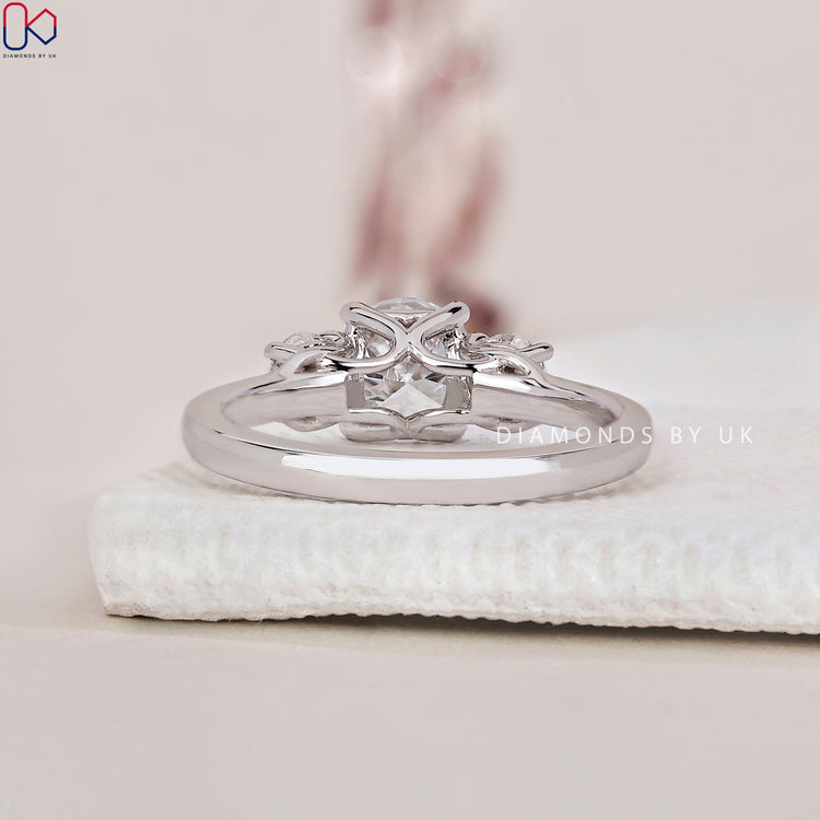 Handmade jewellery with a 3 stone diamond engagement ring design.