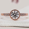 Milgrain bezel engagement ring with round diamond.
