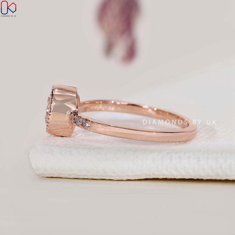 Buy engagement ring featuring a round diamond.
