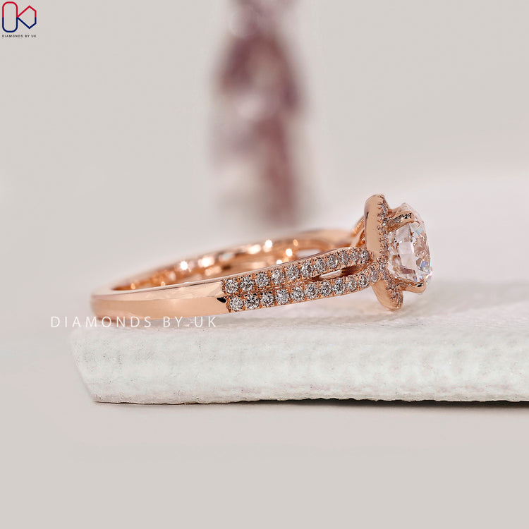 Prong setting ring with round cut lab grown diamond.
