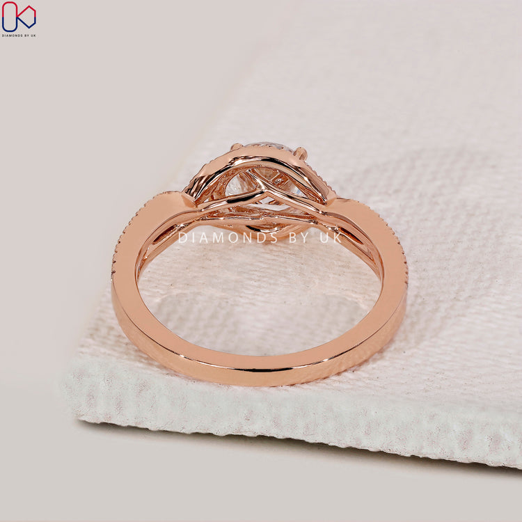 Customize ring with rose gold and round cut center.
