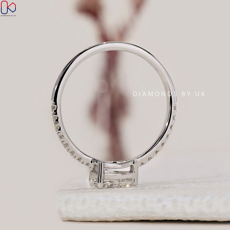 Buy engagement ring with pave and unique setting style.
