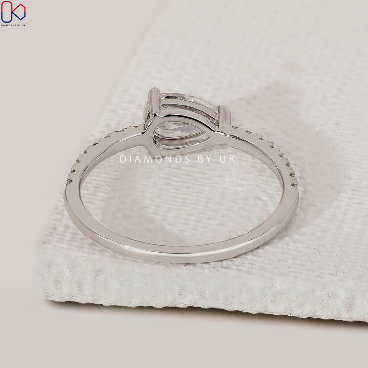 V prong setting ring with east to west pear diamond.
