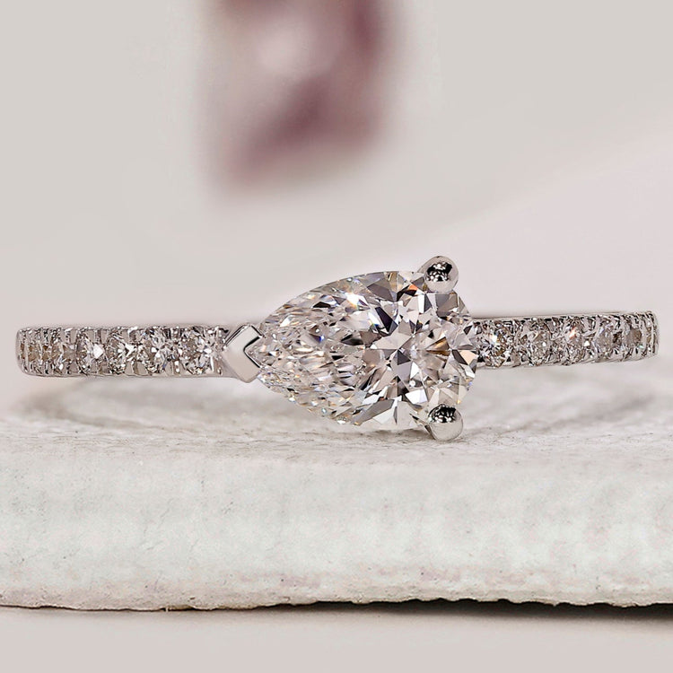 Pave Diamond Ring In Pear Cut East To West Setting