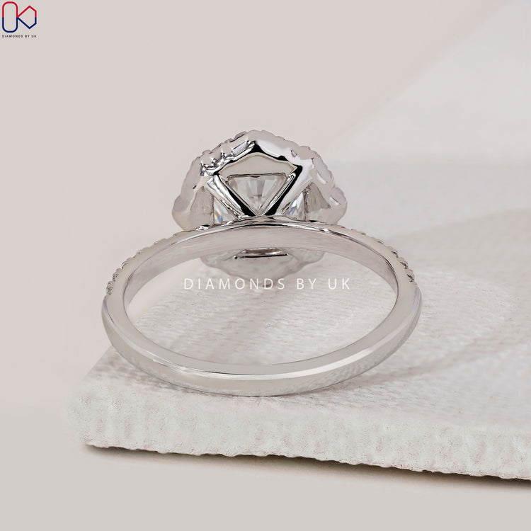 White gold engagement ring with handmade ring.
