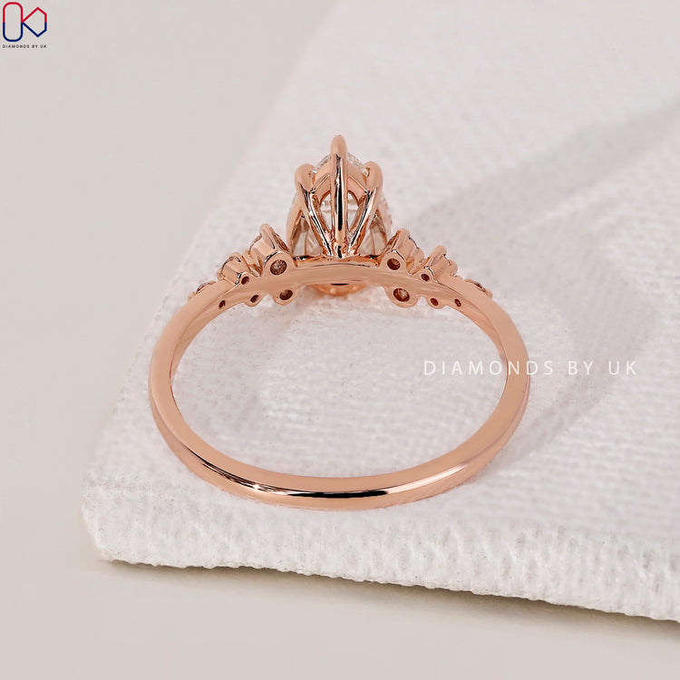 Rose Gold Engagement Ring with intricate details.
