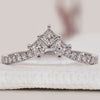 Princess cut and round diamond band in a handmade wedding design.