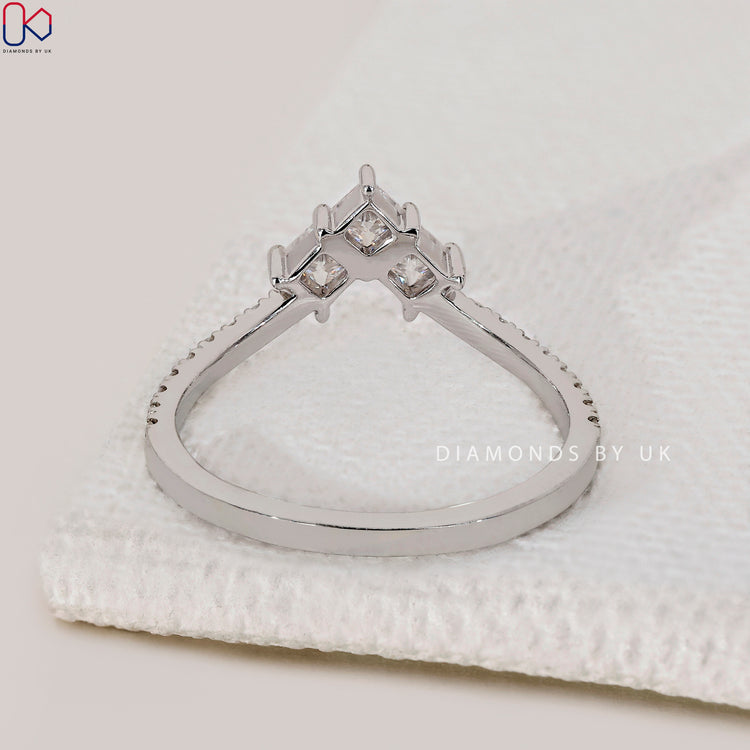 Prong set wedding band in v shaped design with Lab Grown Diamond.