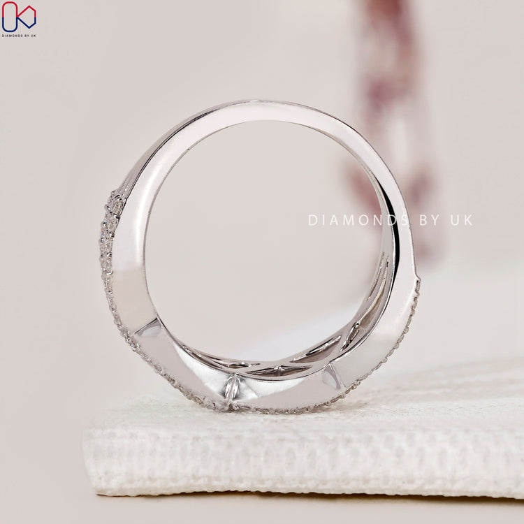 Wave wedding band styled with handmade band craftsmanship.
