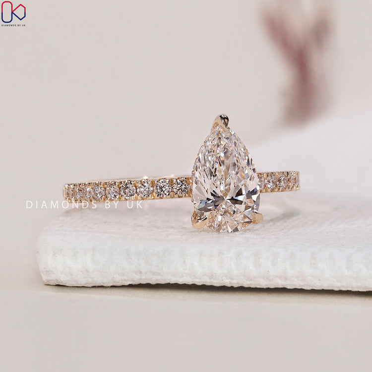 Elegant Pear Diamond Ring in Yellow Gold
