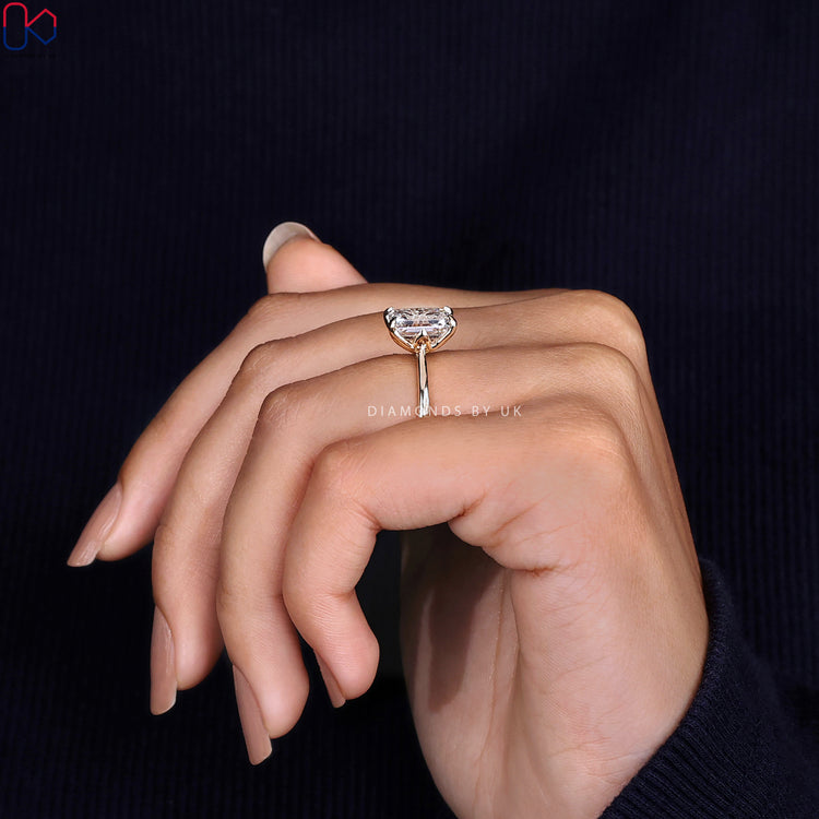 Handmade Ring with Emerald Solitaire Design
