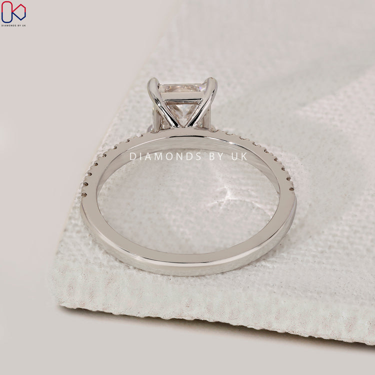 Buy engagement ring with princess cut and pave setting.

