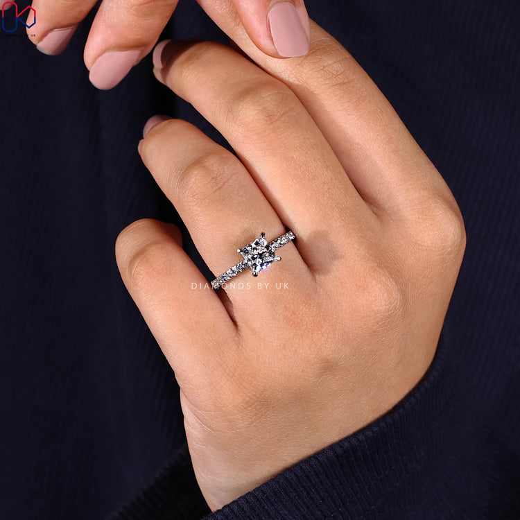 Handmade ring with princess cut and pave band.
