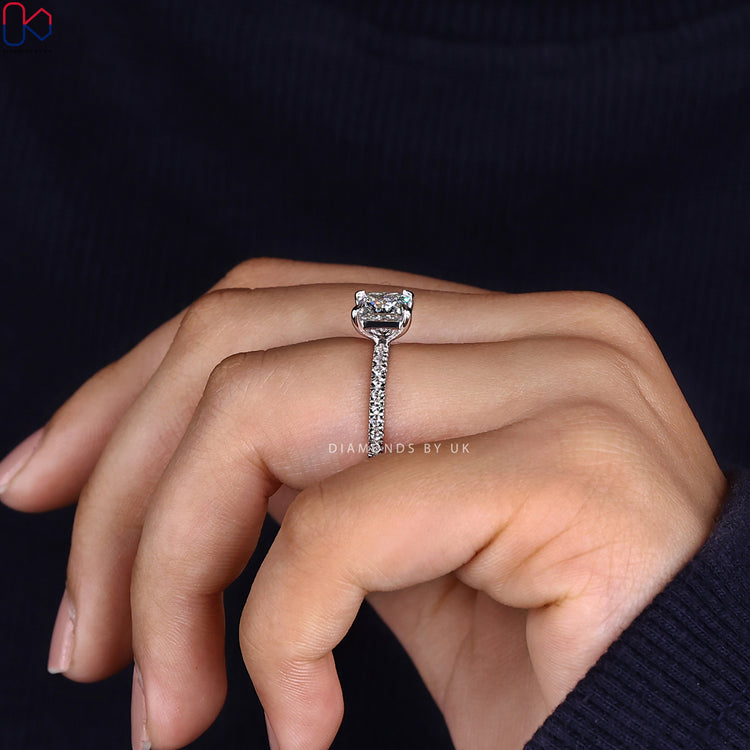 Handmade jewellery featuring princess diamond and pave accents.
