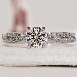 Round Cut Diamond Ring With Twisted Pave Set
