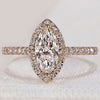Marquise diamond engagement ring with unique shape.
