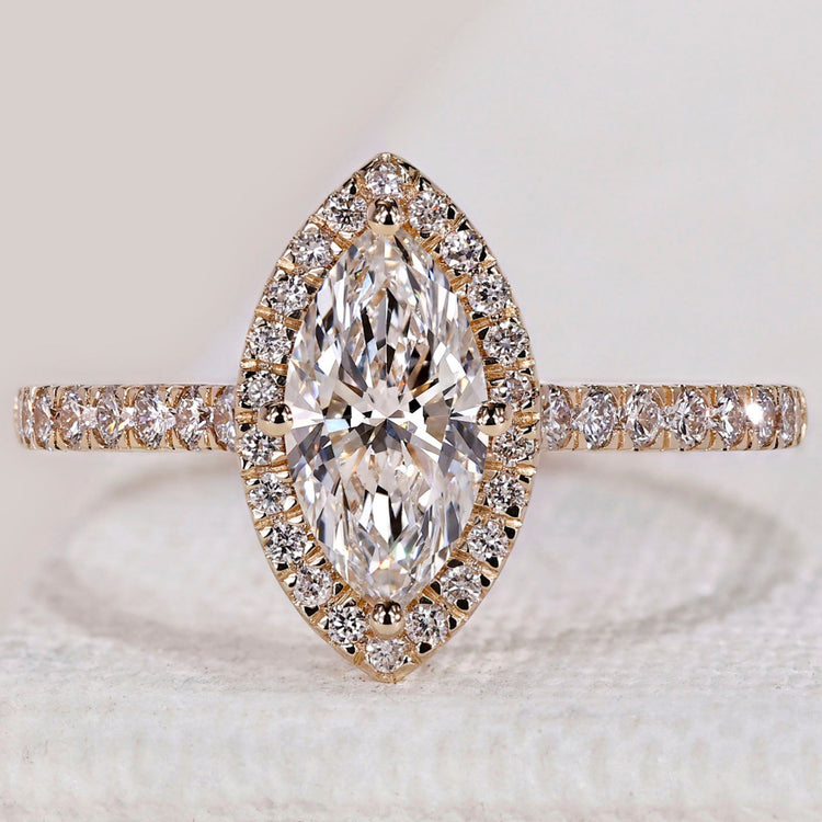 Marquise diamond engagement ring with unique shape.
