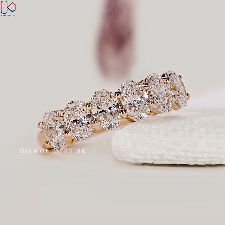 Six stones wedding band handmade with oval diamonds for daily wear or stacking.
