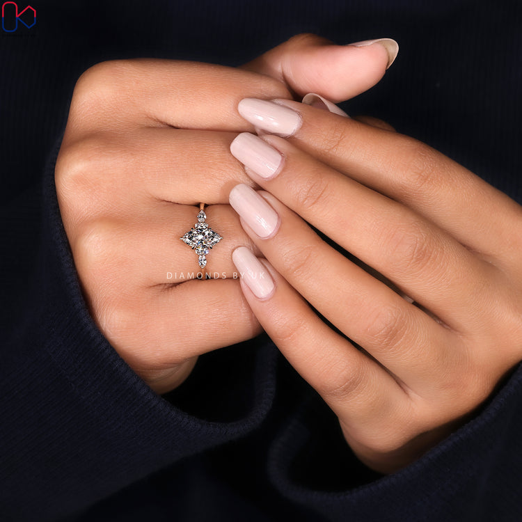 Marquise and round stone lab grown diamond ring.