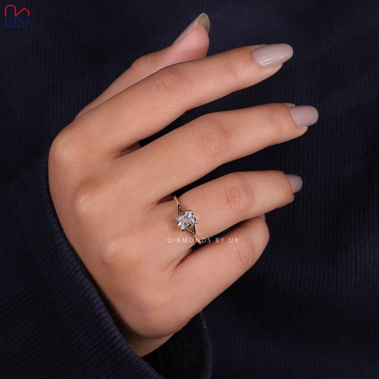 Claw prong cushion cut lab grown diamond ring.
