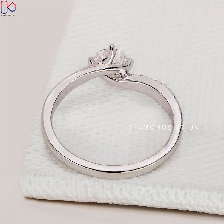 IGI Certified round cut diamond engagement ring.