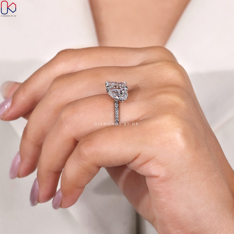 Lab grown Toi et Moi ring with pavé diamonds.
