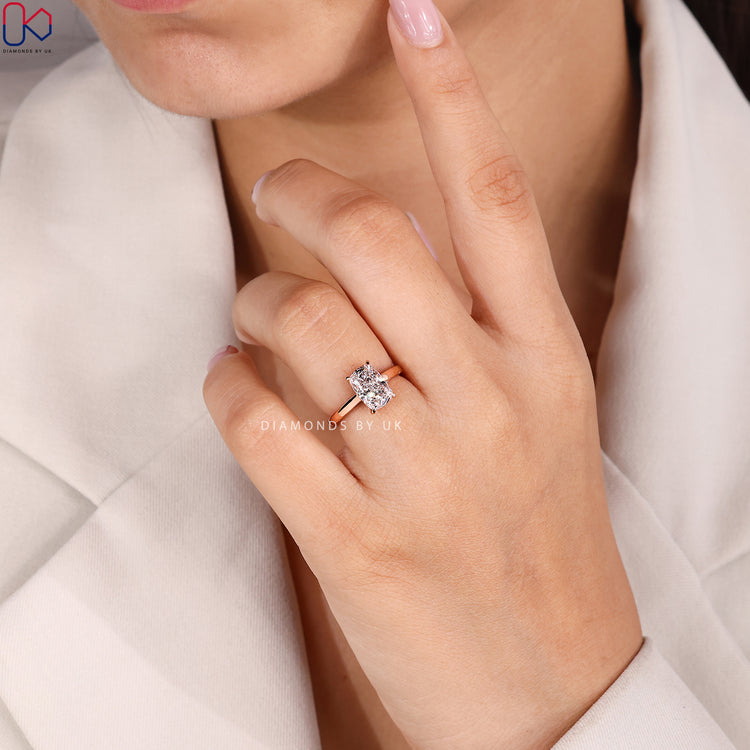 Cushion cut diamond ring with secure four claws.
