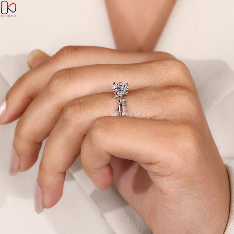 Lab grown round cut ring with hidden halo.