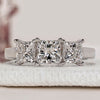 Princess cut three stone diamond engagement ring.