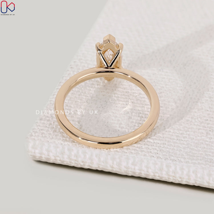 Handmade marquise cut ring with V prong setting.