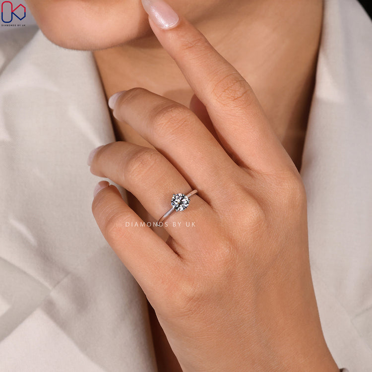 Three prong round diamond ring, handmade design.
