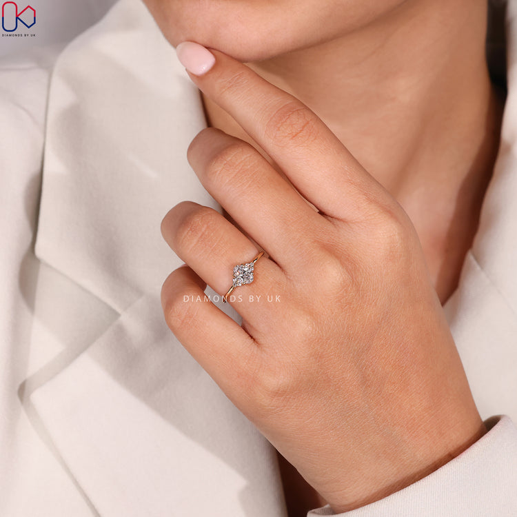 Oval cut ring with round side diamonds, handmade.