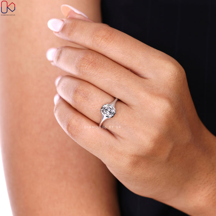 Lab grown Cushion Old European ring with tapered shank.
