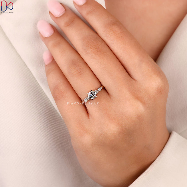 Round cut ring with secure claw prong setting.
